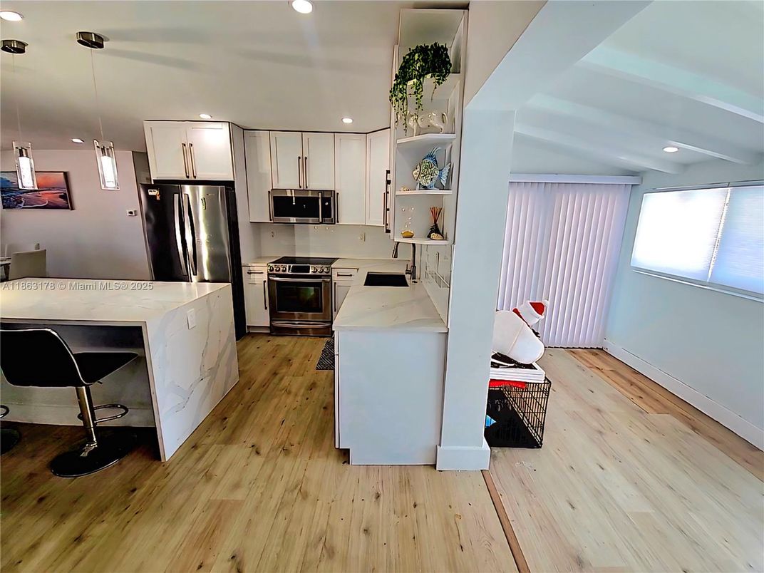 Interior, Kitchen, Pendant Lights, Recessed Lighting, Stainless Steel Appliances, Wood Texture Flooring