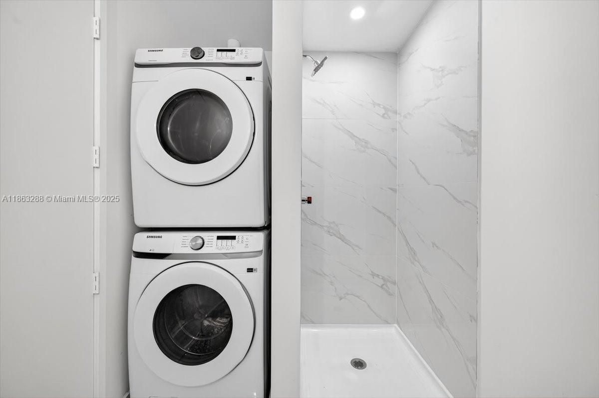 Bathroom, Interior, Marble Walls, Recessed Lighting, Utility Closets, Washer