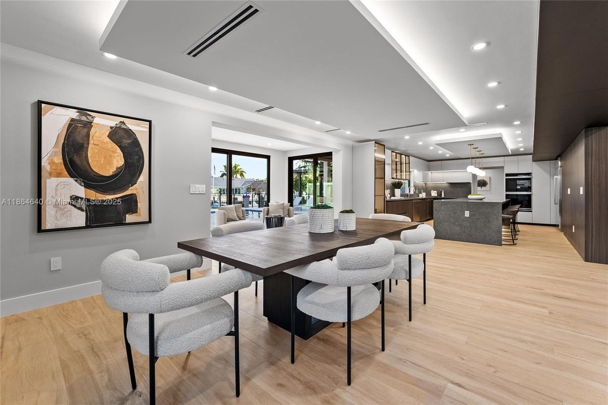 Dining room, Interior, Kitchen, Recessed Lighting, Stainless Steel Appliances, Wood Texture Flooring