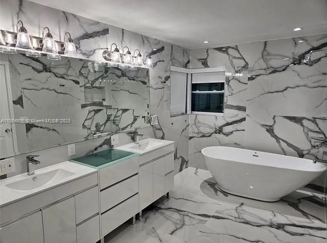 Bathroom, Dual Sink Vanities, Free Standing Baths, Interior, Marble, Marble Walls, Recessed Lighting