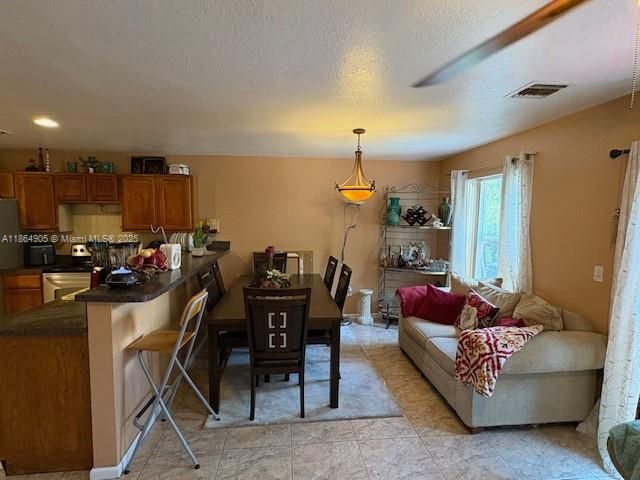 Dining room, Interior, Kitchen, Living room, Pendant Lights, Recessed Lighting, Stainless Steel Appliances