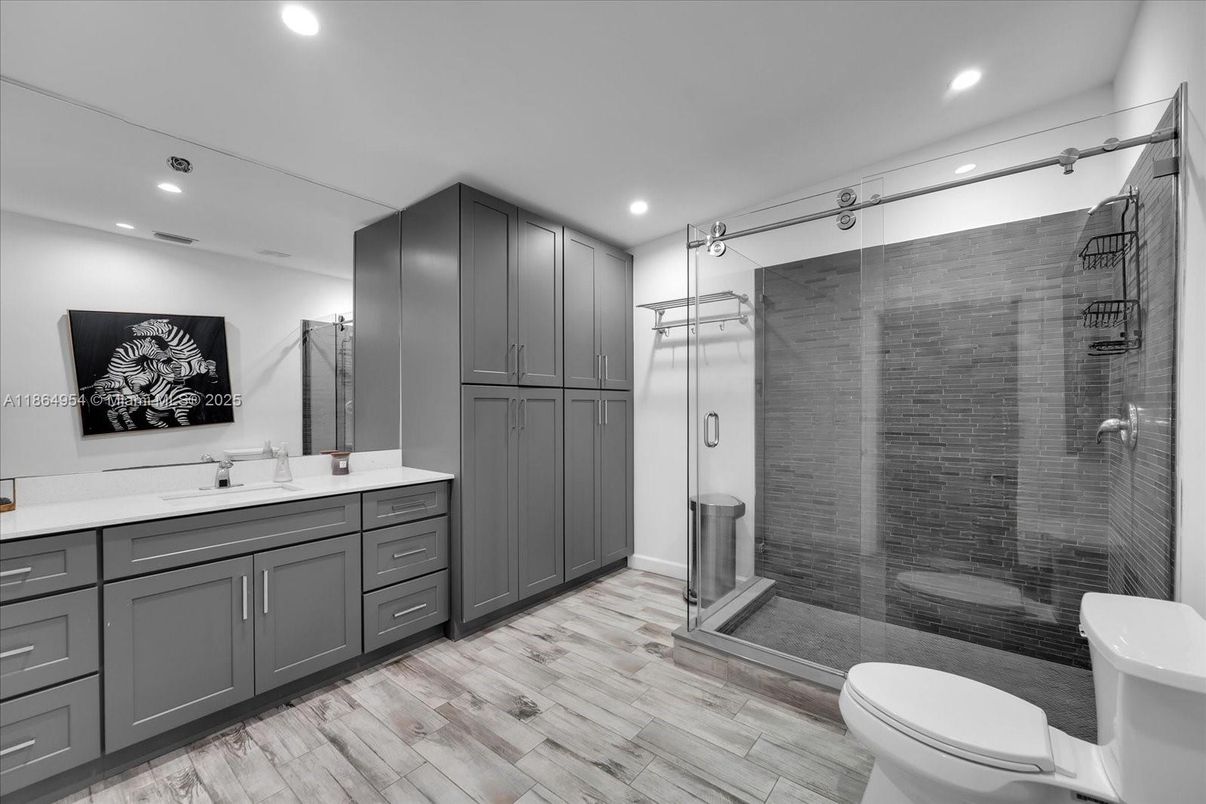 Bathroom, Glass Shower, Interior, Recessed Lighting, Wood Texture Flooring