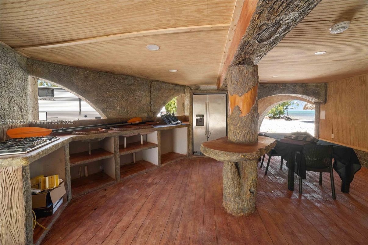 Dining room, Interior, Kitchen, Recessed Lighting, Stainless Steel Appliances, Wood Texture Flooring