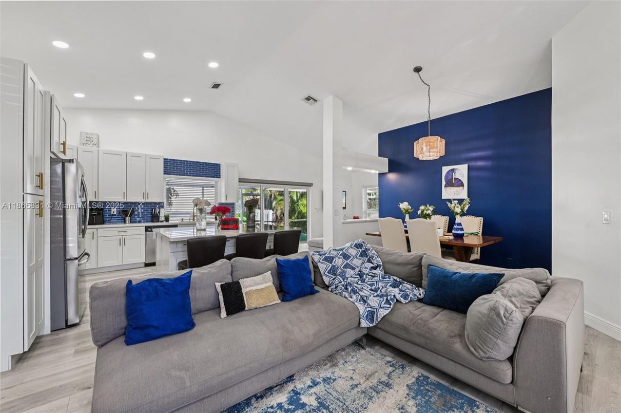 Dining room, Interior, Kitchen, Living room, Pendant Lights, Recessed Lighting, Stainless Steel Appliances, Wood Texture Flooring