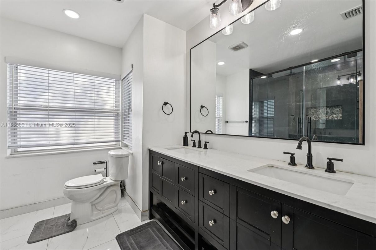 Bathroom, Dual Sink Vanities, Glass Shower, Interior, Marble, Recessed Lighting