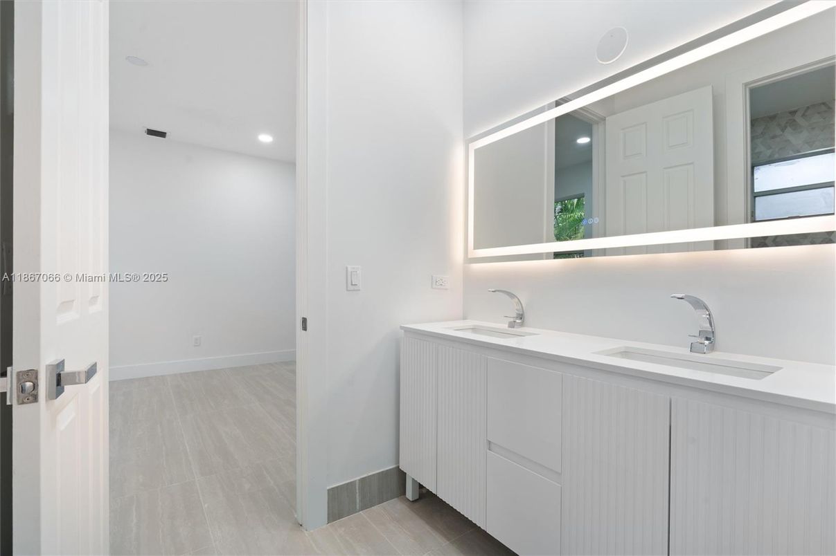 Bathroom, Dual Sink Vanities, Interior, Recessed Lighting, Wood Texture Flooring