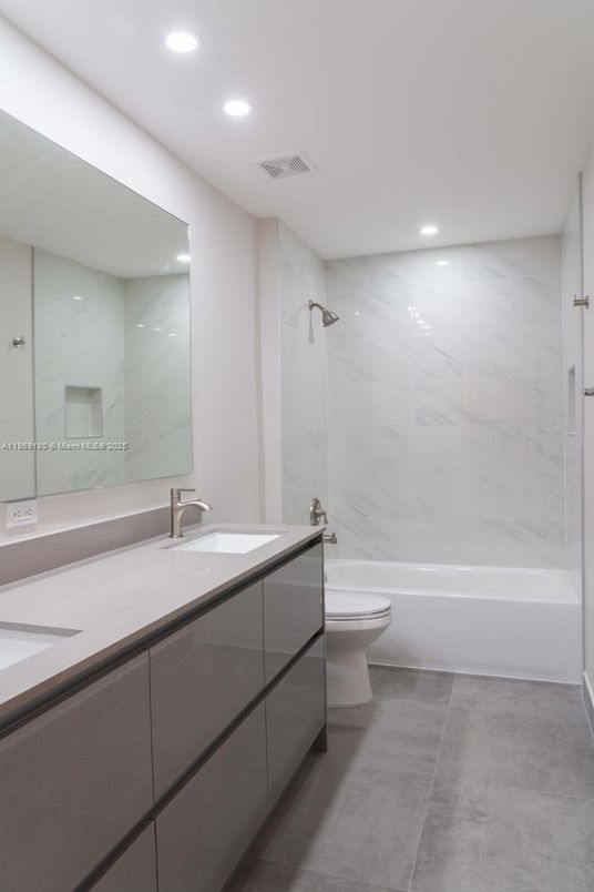 Bathroom, Dual Sink Vanities, Interior, Marble Walls, Recessed Lighting