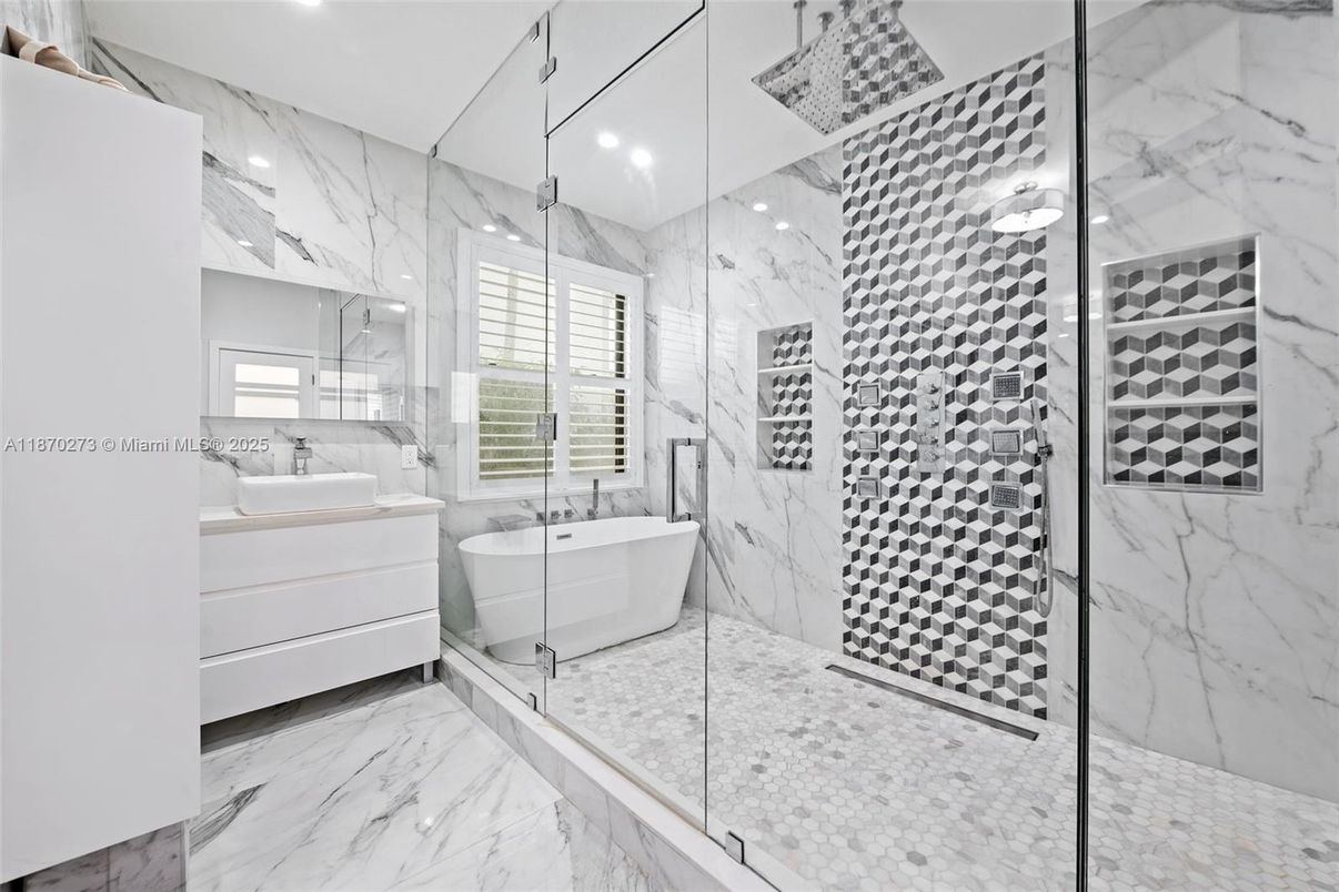 Bathroom, Free Standing Baths, Glass Shower, Interior, Marble, Marble Walls, Recessed Lighting