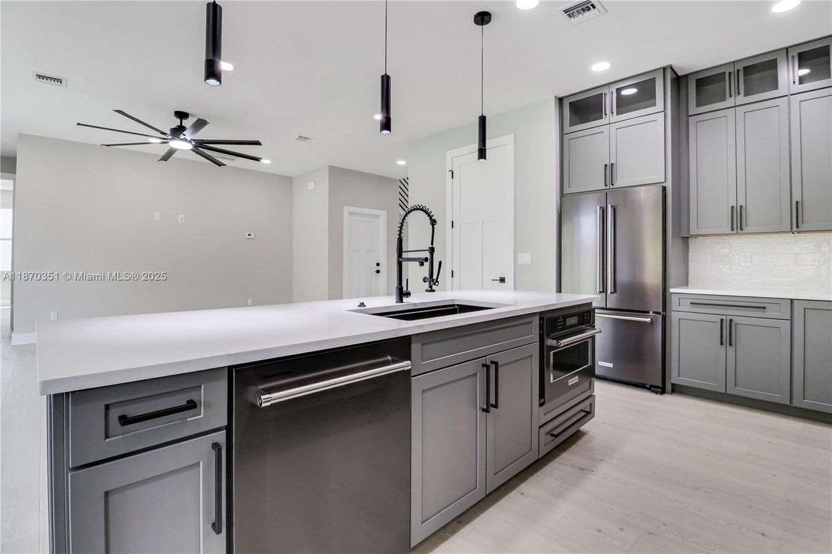 Interior, Kitchen, Pendant Lights, Recessed Lighting, Stainless Steel Appliances, Wood Texture Flooring