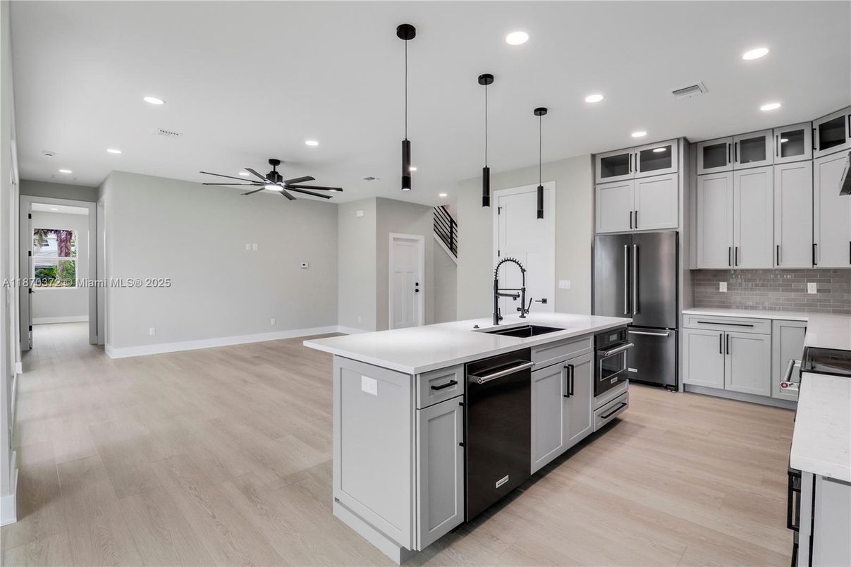Interior, Kitchen, Pendant Lights, Recessed Lighting, Stainless Steel Appliances, Wood Texture Flooring