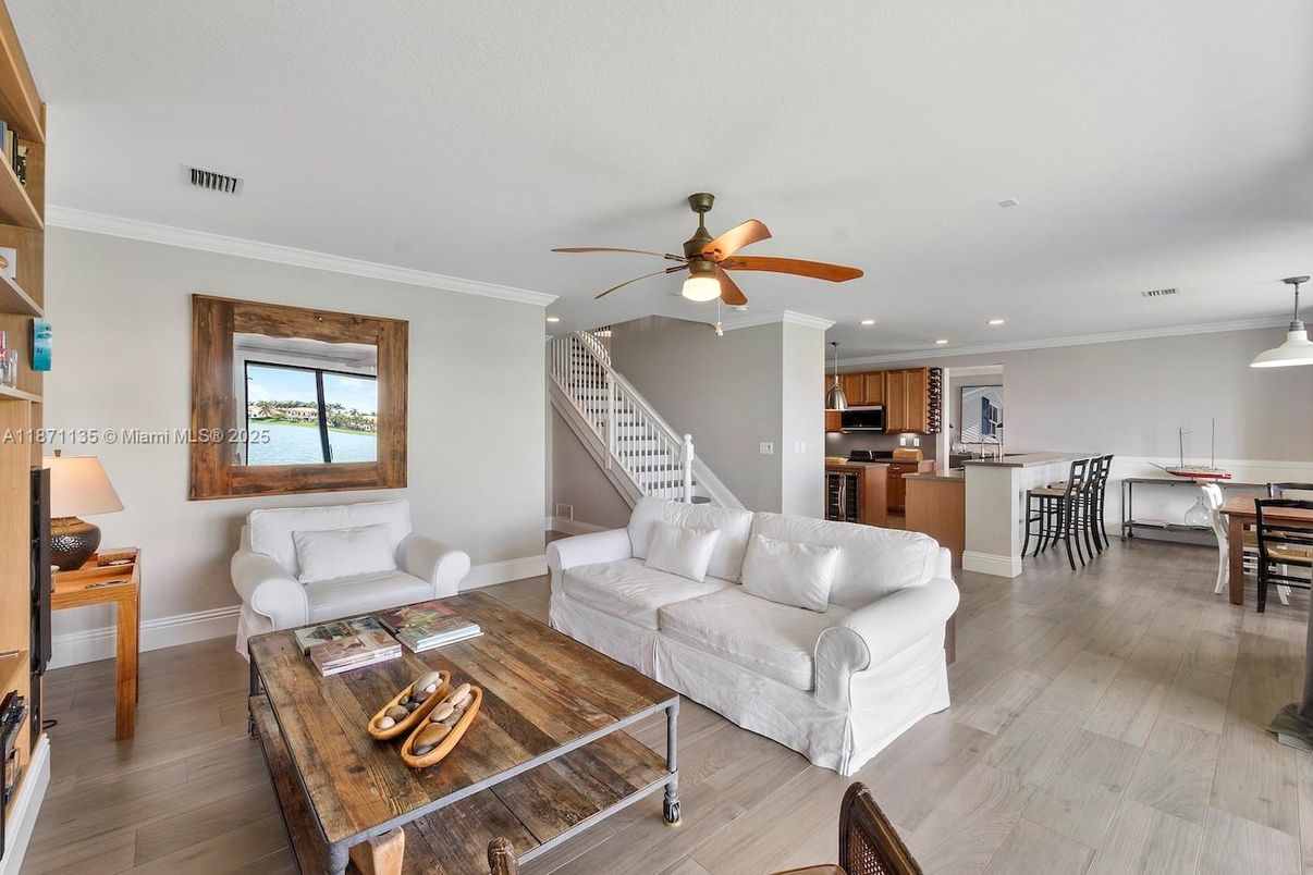 Dining room, Interior, Kitchen, Living room, Pendant Lights, Recessed Lighting, Stainless Steel Appliances, Wood Texture Flooring