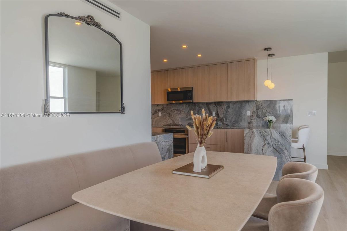 Dining room, Interior, Kitchen, Marble Walls, Pendant Lights, Recessed Lighting, Wood Texture Flooring