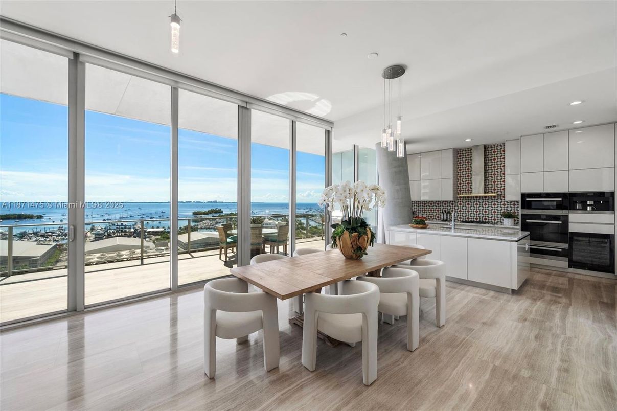 Dining room, Interior, Kitchen, Pendant Lights, Recessed Lighting, Stainless Steel Appliances, Water, Wood Texture Flooring