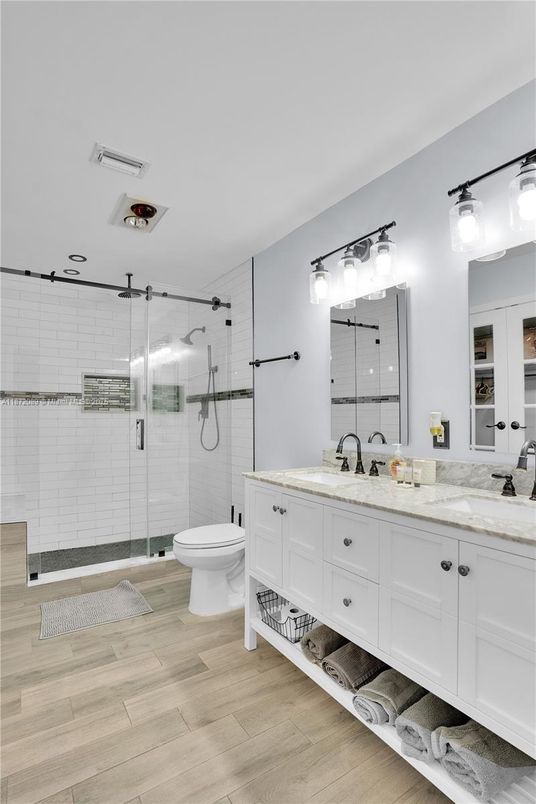 Bathroom, Dual Sink Vanities, Glass Shower, Interior, Wood Texture Flooring