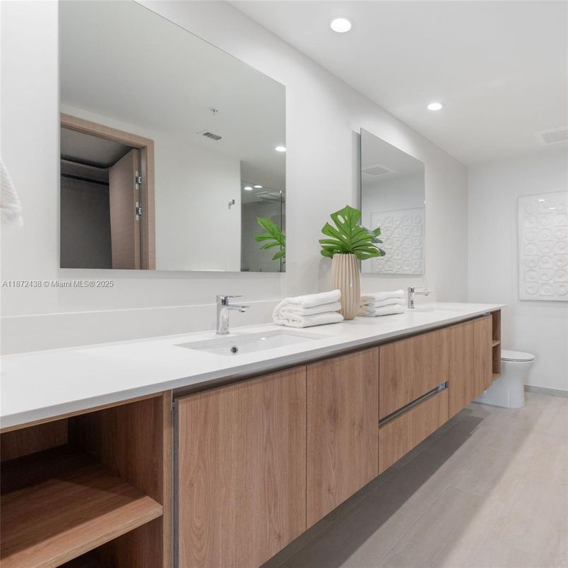 Bathroom, Dual Sink Vanities, Interior, Recessed Lighting, Wood Texture Flooring
