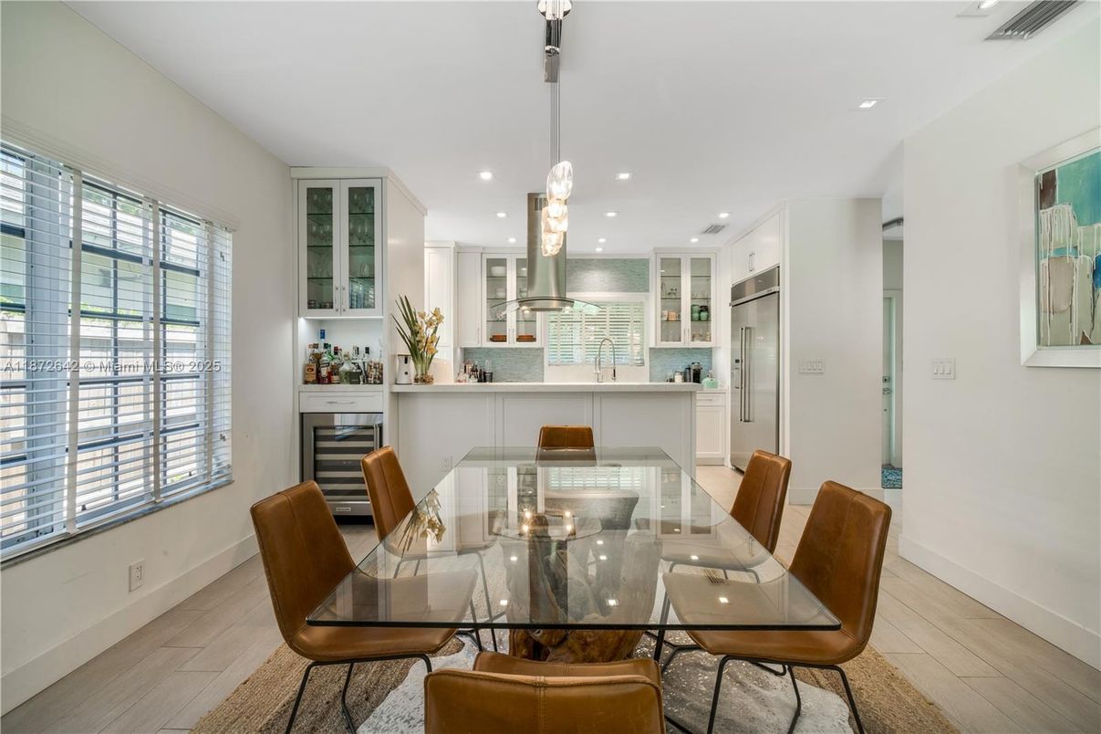 Dining room, Interior, Kitchen, Pendant Lights, Recessed Lighting, Stainless Steel Appliances, Wood Texture Flooring