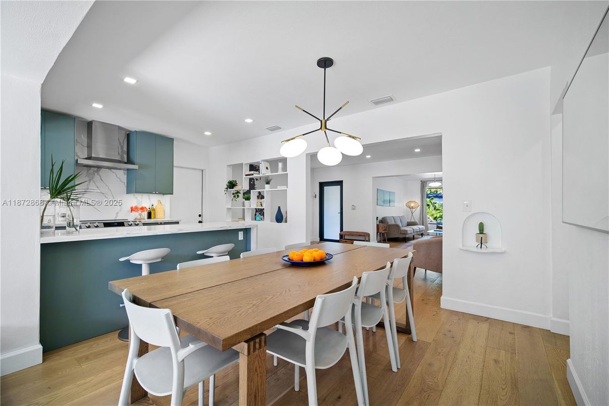 Dining room, Interior, Kitchen, Pendant Lights, Recessed Lighting, Stainless Steel Appliances, Wood Texture Flooring