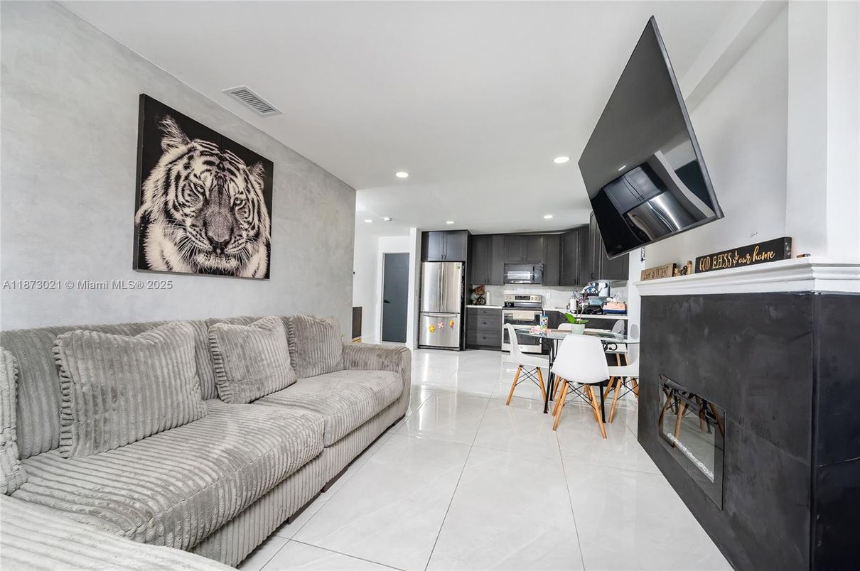 Dining room, Fireplace, Interior, Kitchen, Living room, Recessed Lighting, Stainless Steel Appliances