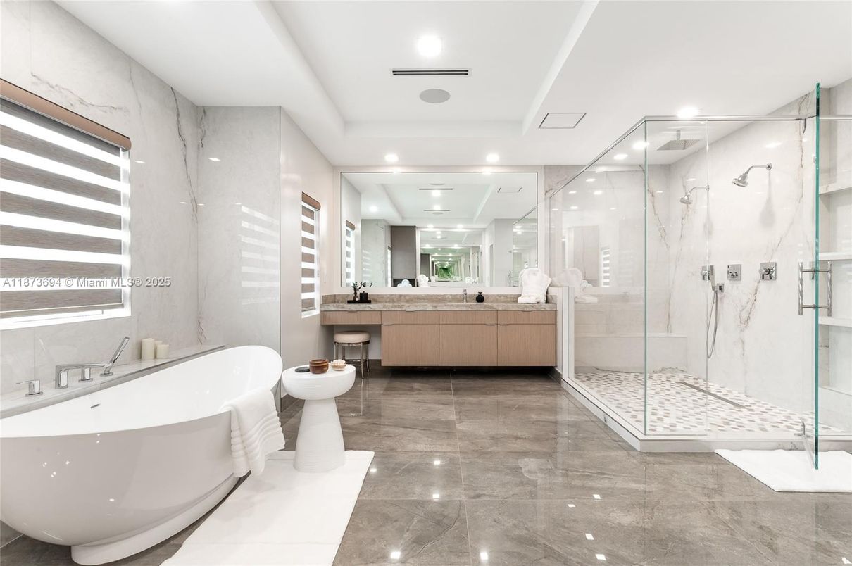 Bathroom, Dual Sink Vanities, Free Standing Baths, Glass Shower, Interior, Marble Walls, Recessed Lighting