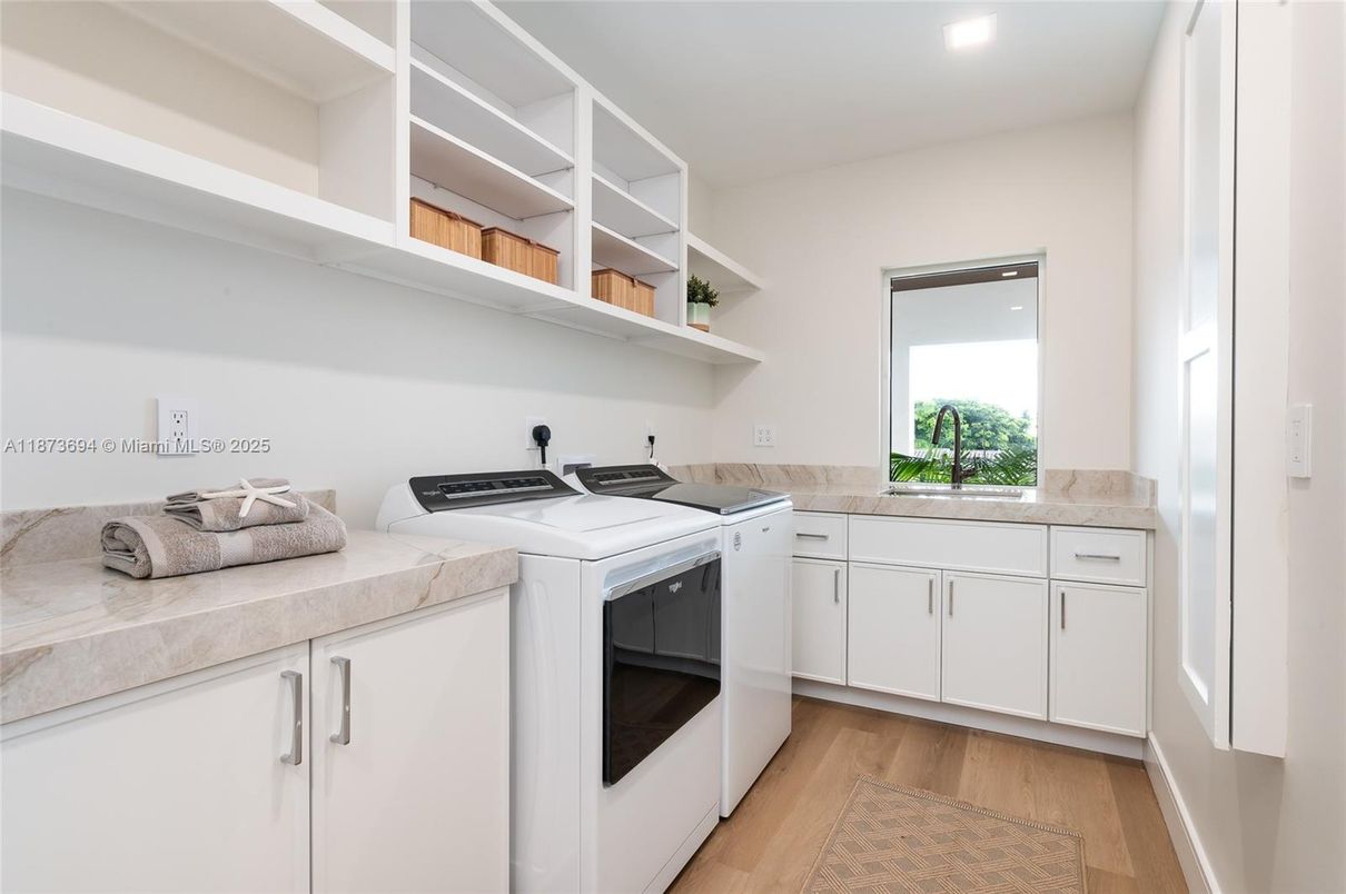 Interior, Kitchen, Recessed Lighting, Washer, Wood Texture Flooring