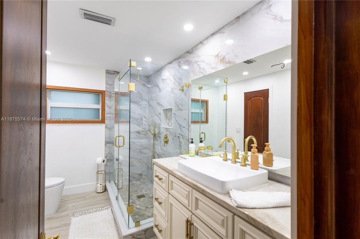 Bathroom, Glass Shower, Interior, Marble Walls, Recessed Lighting, Wood Texture Flooring