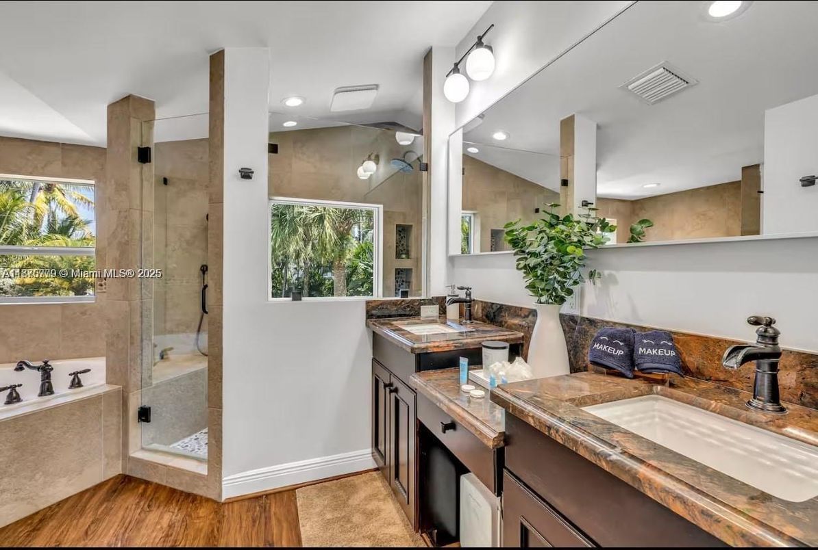Bathroom, Dual Sink Vanities, Glass Shower, Interior, Recessed Lighting, Wood Texture Flooring