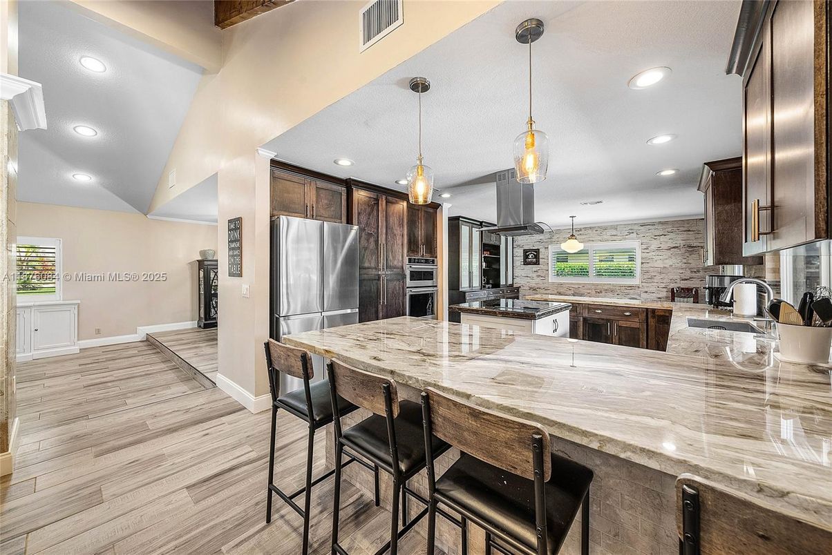 Interior, Kitchen, Pendant Lights, Recessed Lighting, Stainless Steel Appliances, Wood Texture Flooring