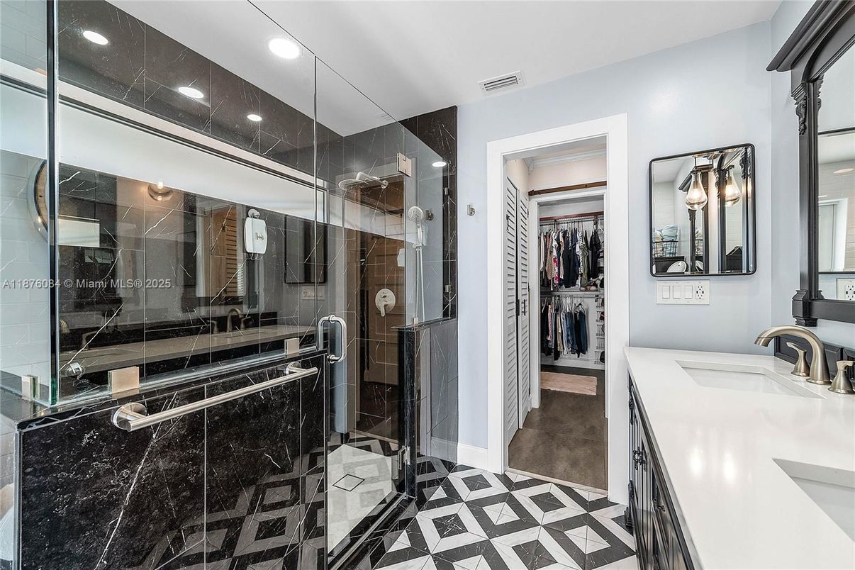 Bathroom, Dual Sink Vanities, Glass Shower, Interior, Recessed Lighting, Walk-in Closets