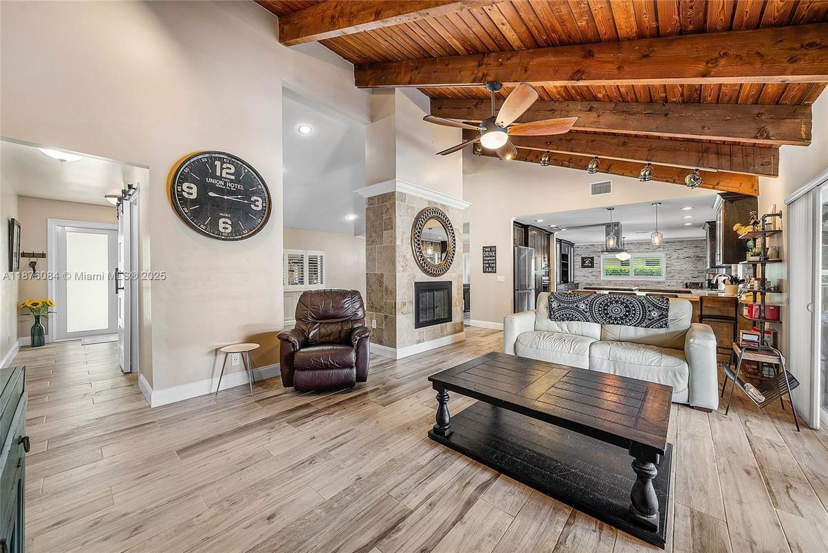 Fireplace, Interior, Living room, Pendant Lights, Recessed Lighting, Wooden Beams, Wooden Ceilings, Wood Texture Flooring