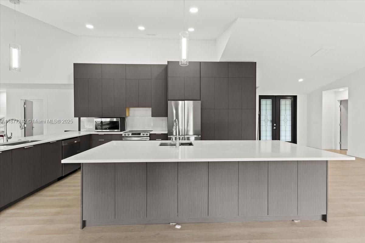 Interior, Kitchen, Pendant Lights, Recessed Lighting, Stainless Steel Appliances, Wood Texture Flooring