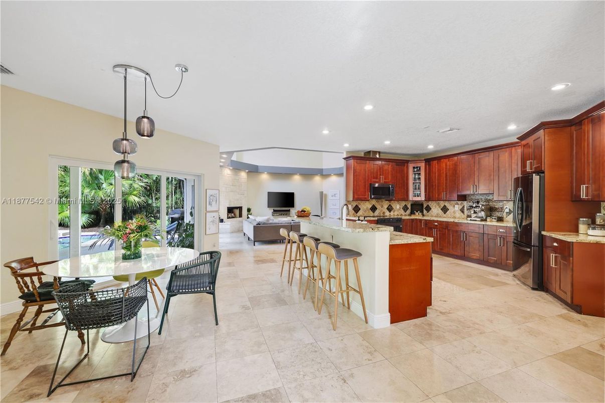 Dining room, Fireplace, Interior, Kitchen, Pendant Lights, Recessed Lighting, Stainless Steel Appliances