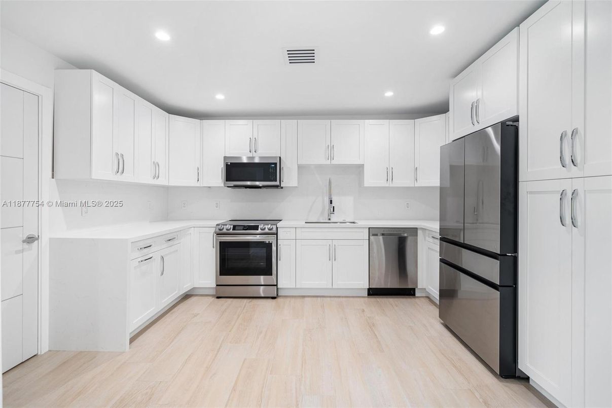 Interior, Kitchen, Recessed Lighting, Stainless Steel Appliances, Wood Texture Flooring