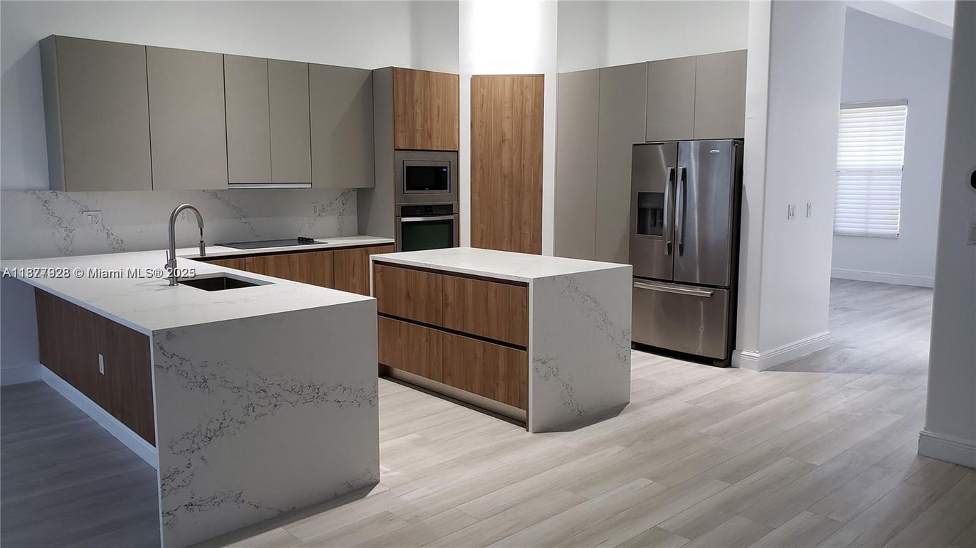 Interior, Kitchen, Marble Walls, Stainless Steel Appliances, Wood Texture Flooring