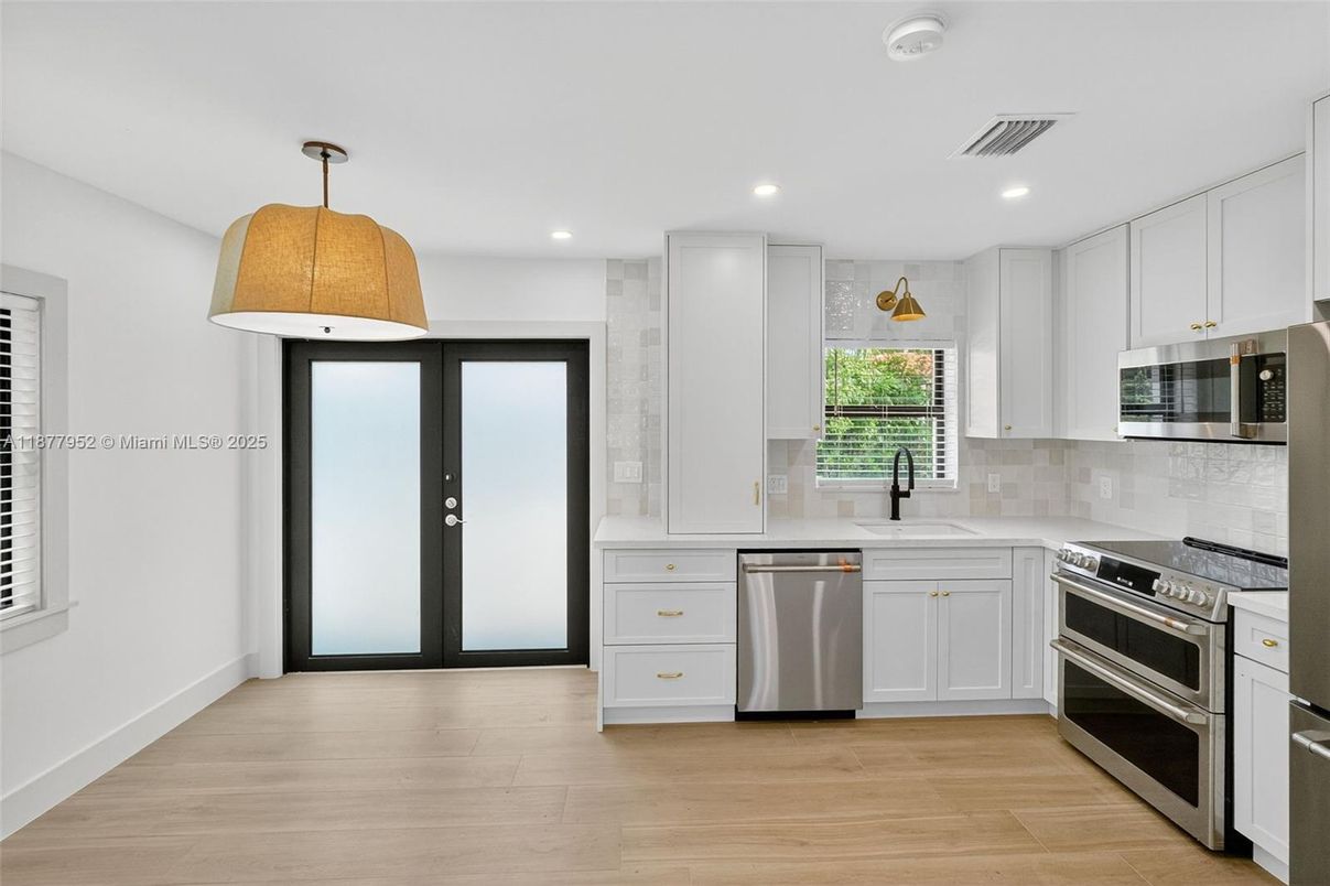 Interior, Kitchen, Pendant Lights, Recessed Lighting, Stainless Steel Appliances, Wood Texture Flooring