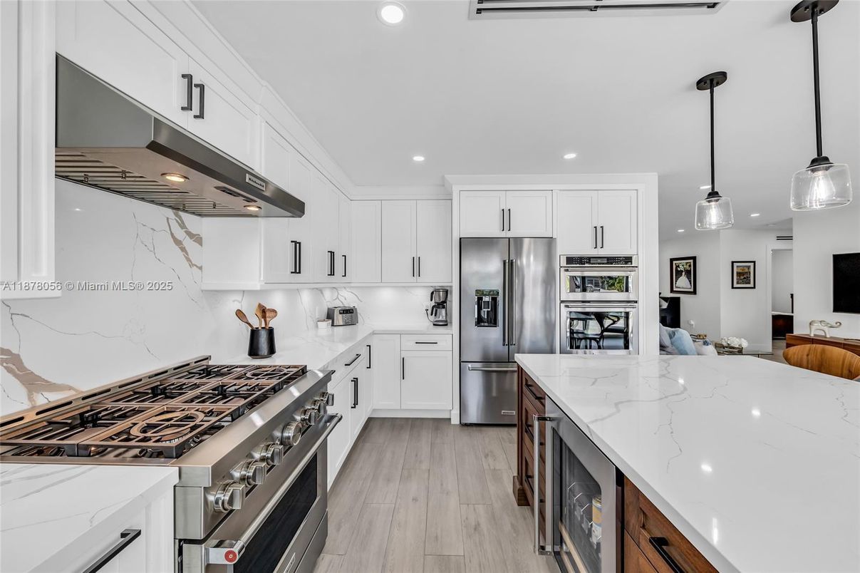 Interior, Kitchen, Pendant Lights, Recessed Lighting, Stainless Steel Appliances, Wood Texture Flooring