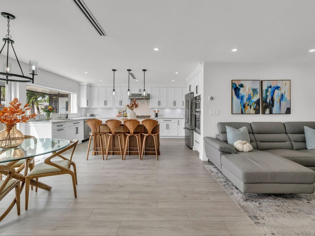Dining room, Interior, Kitchen, Living room, Pendant Lights, Recessed Lighting, Stainless Steel Appliances, Wood Texture Flooring
