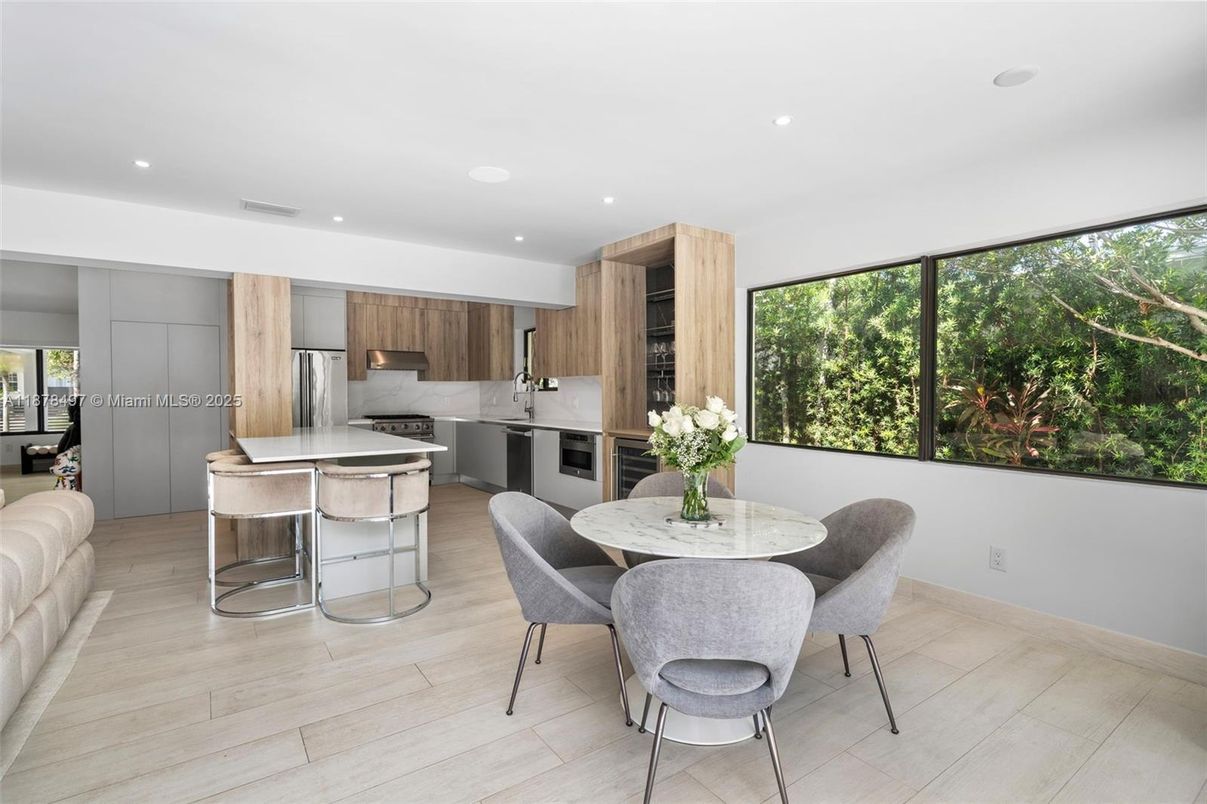 Dining room, Interior, Kitchen, Recessed Lighting, Stainless Steel Appliances, Wood Texture Flooring