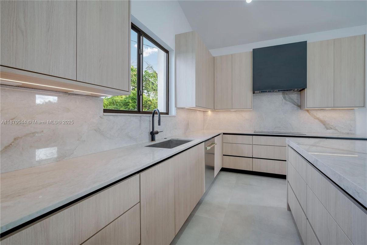 Interior, Kitchen, Marble Walls, Recessed Lighting, Stainless Steel Appliances