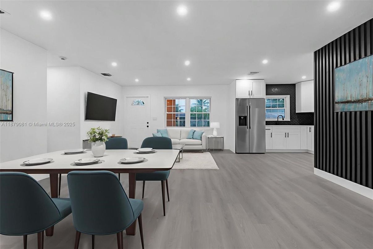 Dining room, Interior, Kitchen, Living room, Recessed Lighting, Stainless Steel Appliances, Wood Texture Flooring