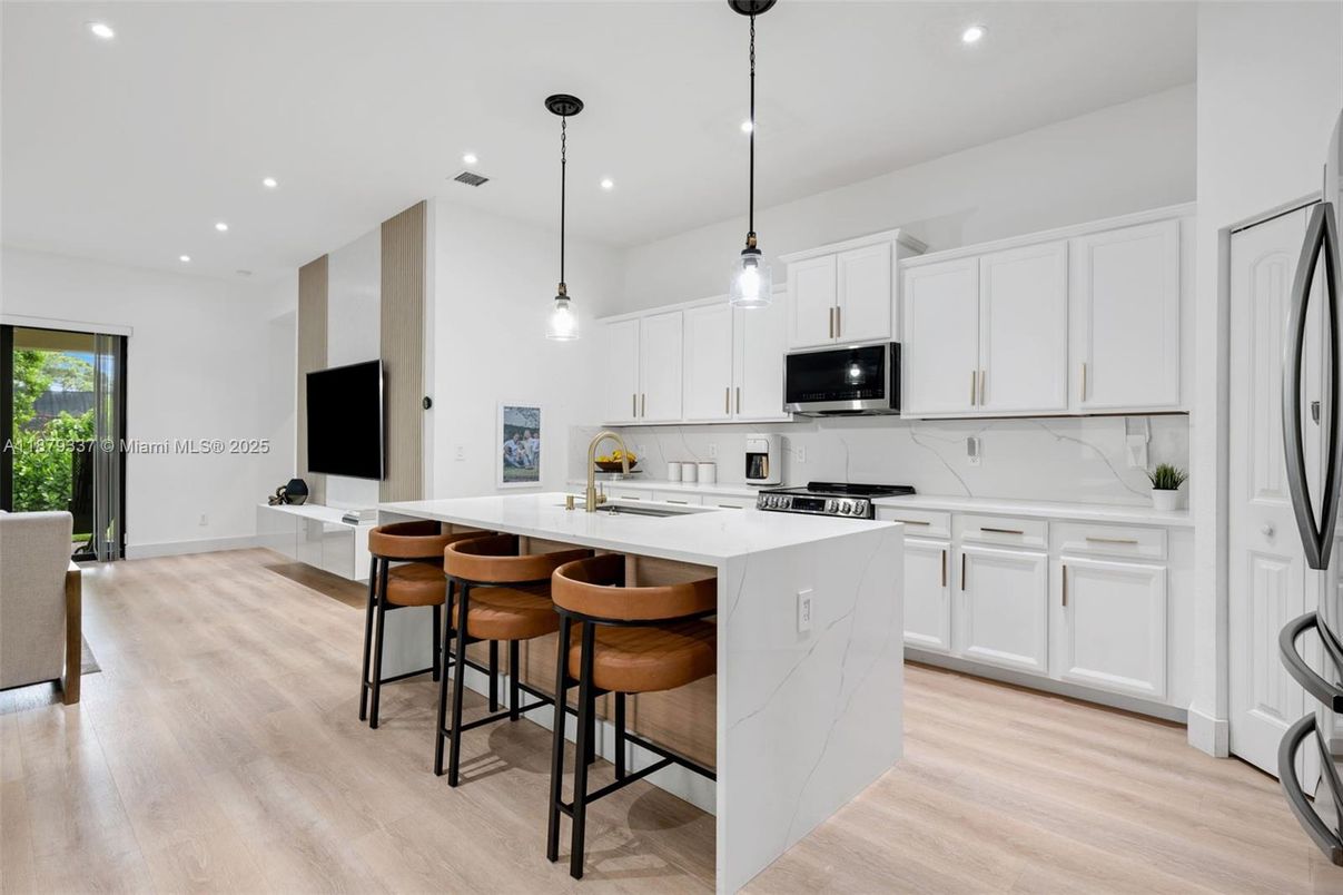 Interior, Kitchen, Marble Walls, Pendant Lights, Recessed Lighting, Wood Texture Flooring