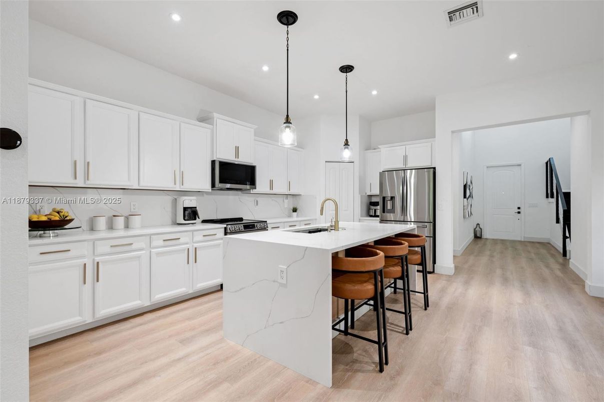 Interior, Kitchen, Pendant Lights, Recessed Lighting, Stainless Steel Appliances, Wood Texture Flooring