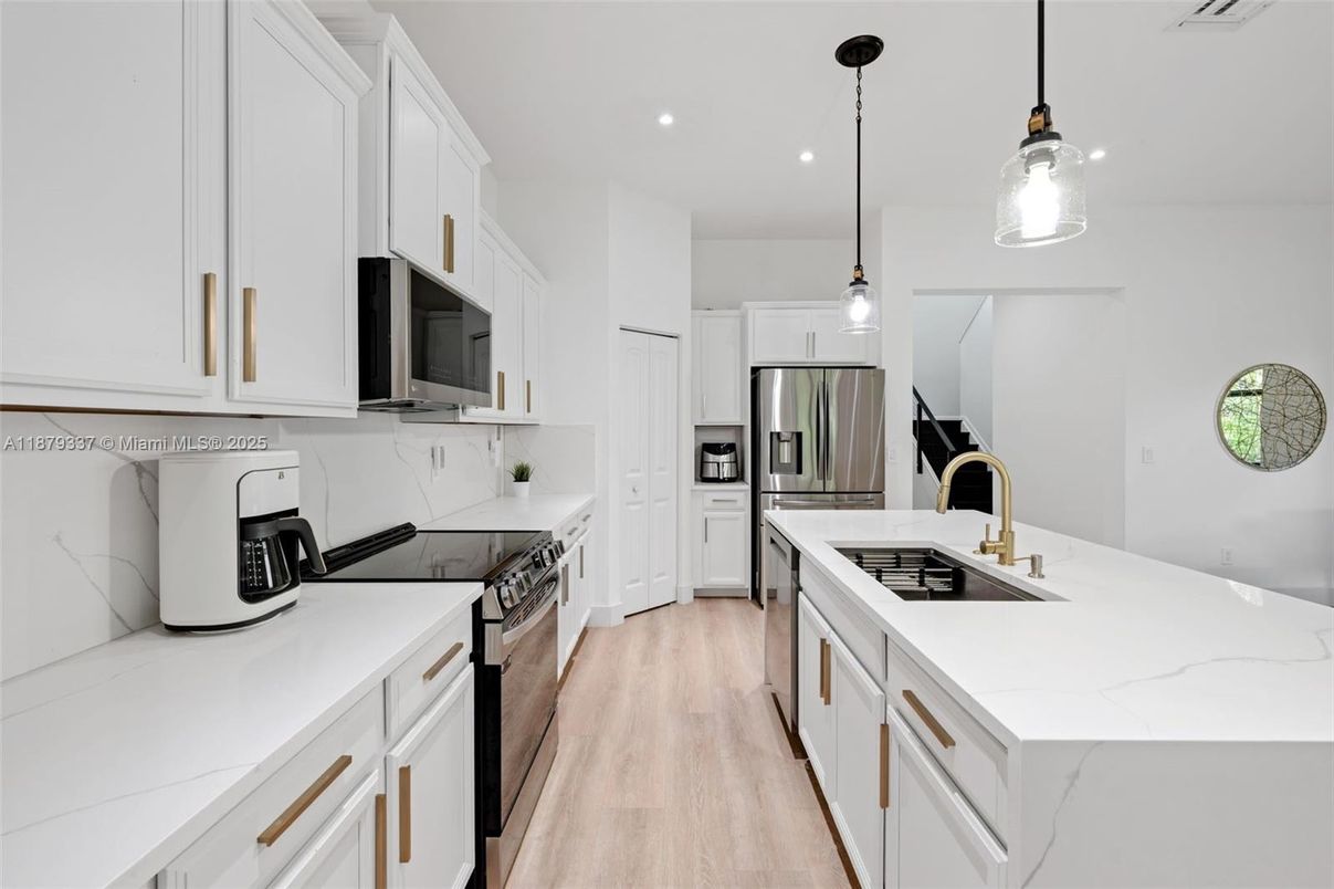 Interior, Kitchen, Pendant Lights, Recessed Lighting, Stainless Steel Appliances, Wood Texture Flooring