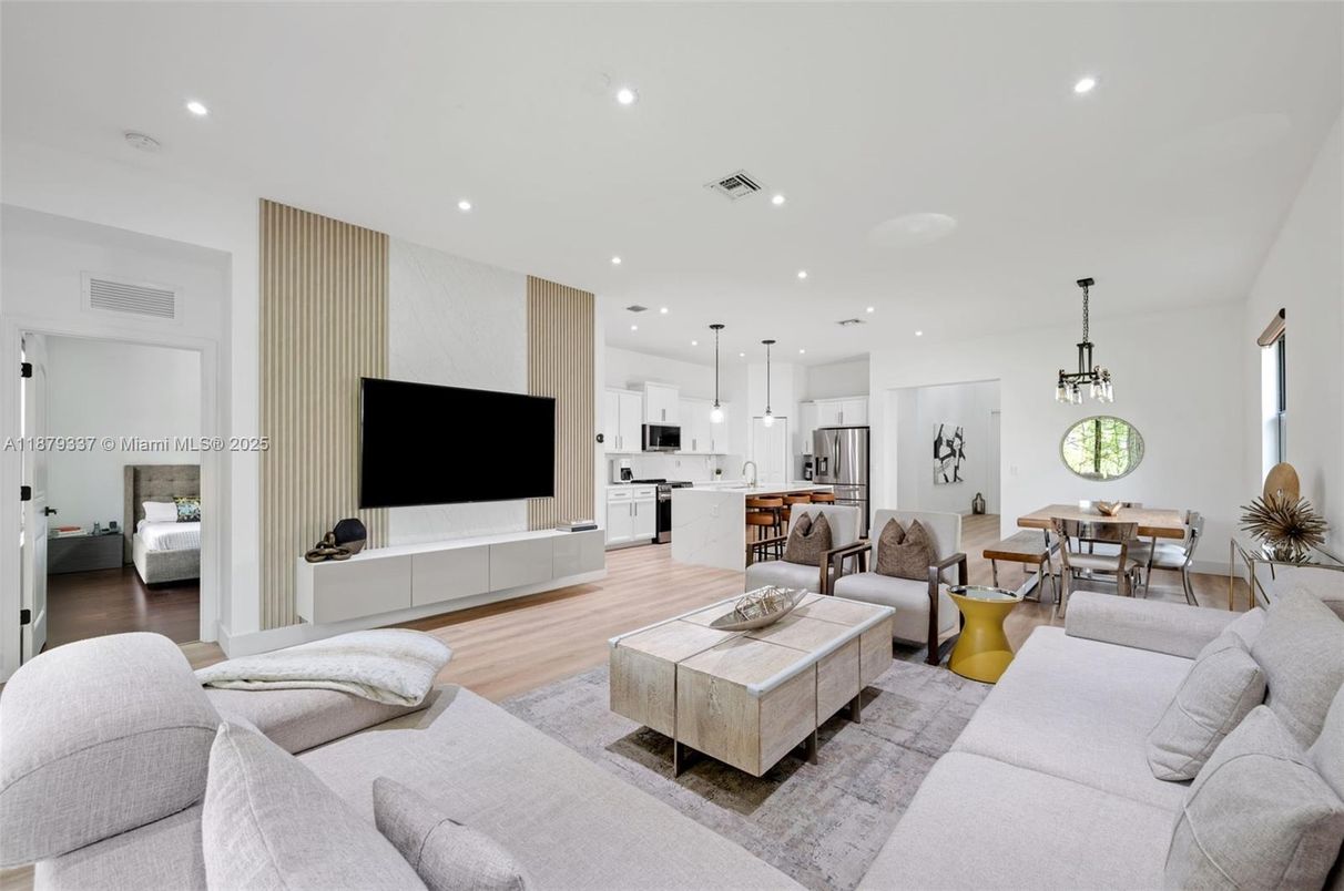 Dining room, Interior, Kitchen, Living room, Pendant Lights, Recessed Lighting, Stainless Steel Appliances, Wood Texture Flooring
