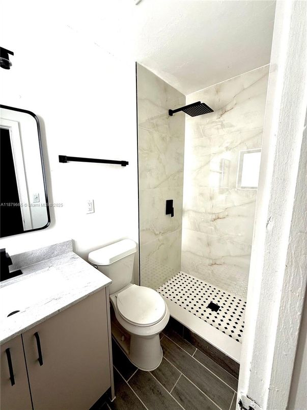 Bathroom, Glass Shower, Interior, Marble Walls, Wood Texture Flooring