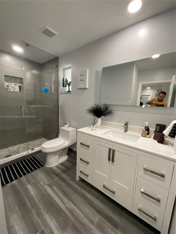 Bathroom, Glass Shower, Interior, Recessed Lighting, Wood Texture Flooring