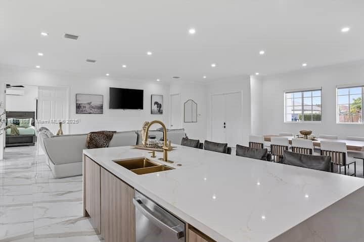 Dining room, Interior, Kitchen, Living room, Marble, Recessed Lighting, Stainless Steel Appliances