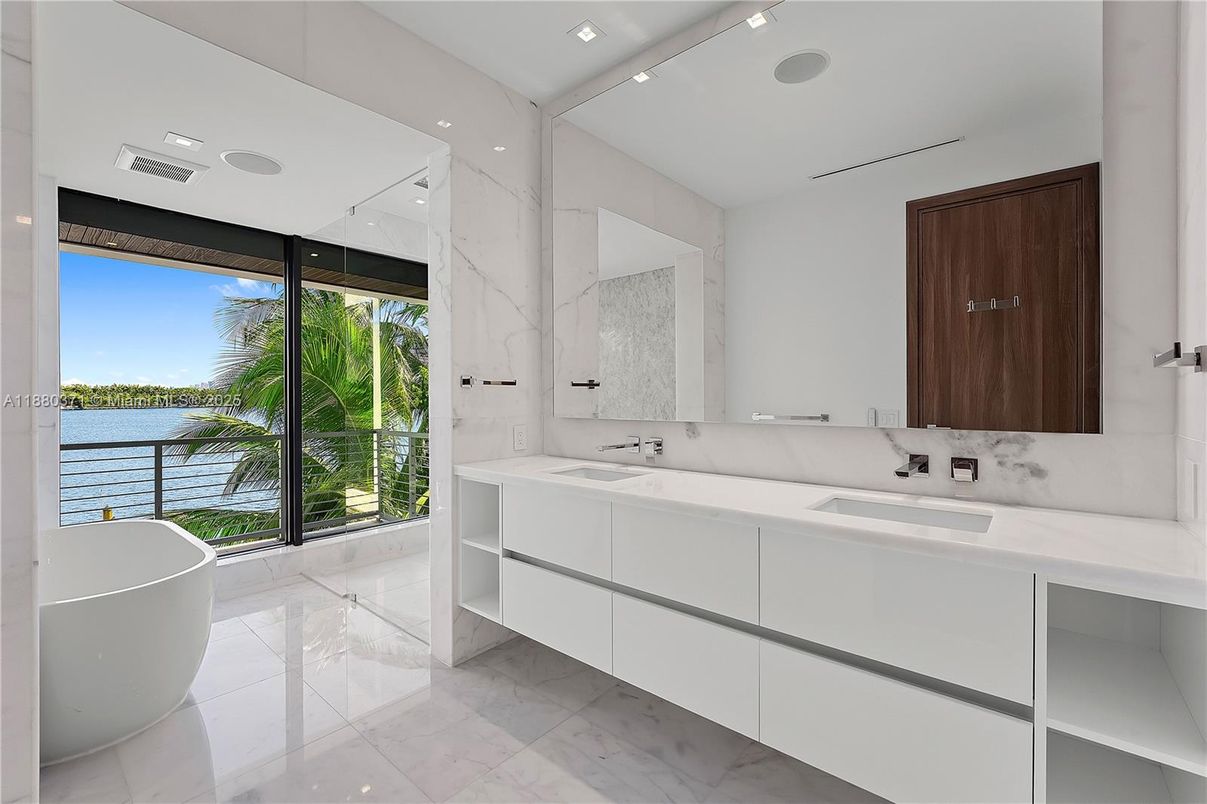 Bathroom, Dual Sink Vanities, Free Standing Baths, Interior, Marble, Marble Walls, Recessed Lighting, Water