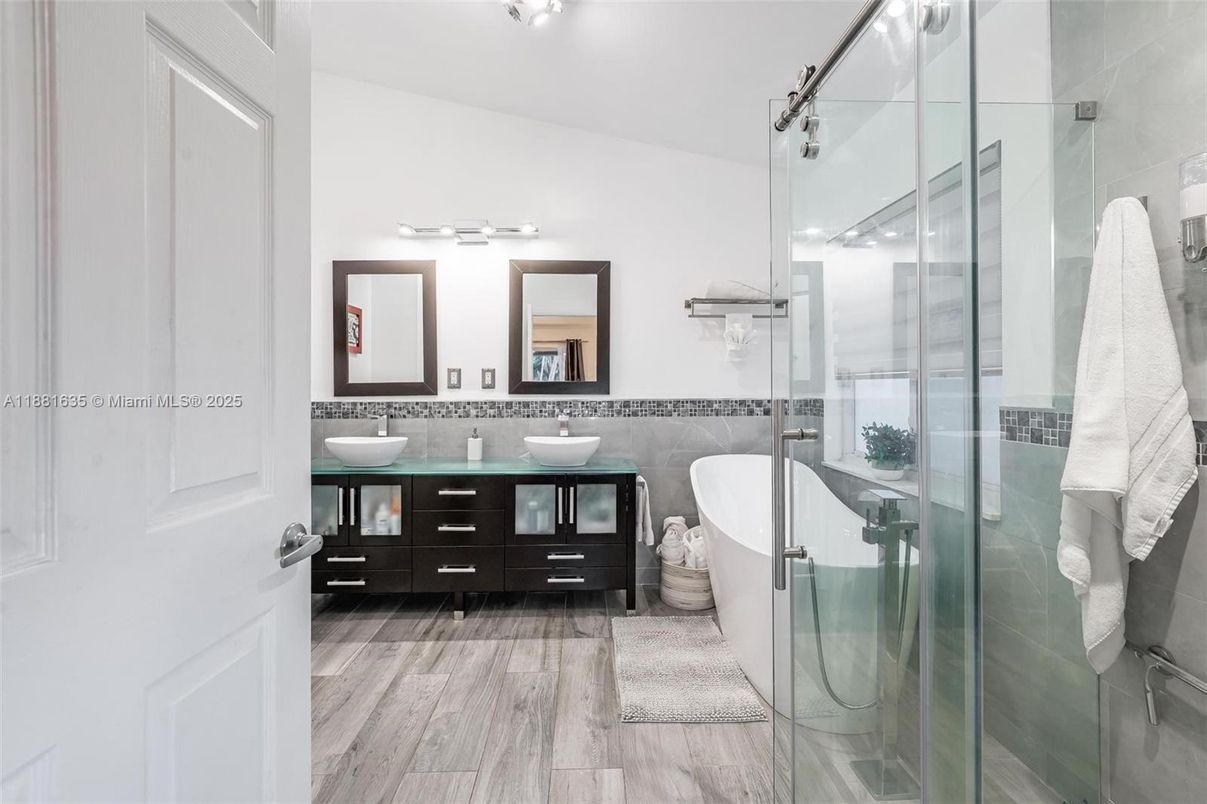 Bathroom, Dual Sink Vanities, Free Standing Baths, Glass Shower, Interior, Wood Texture Flooring