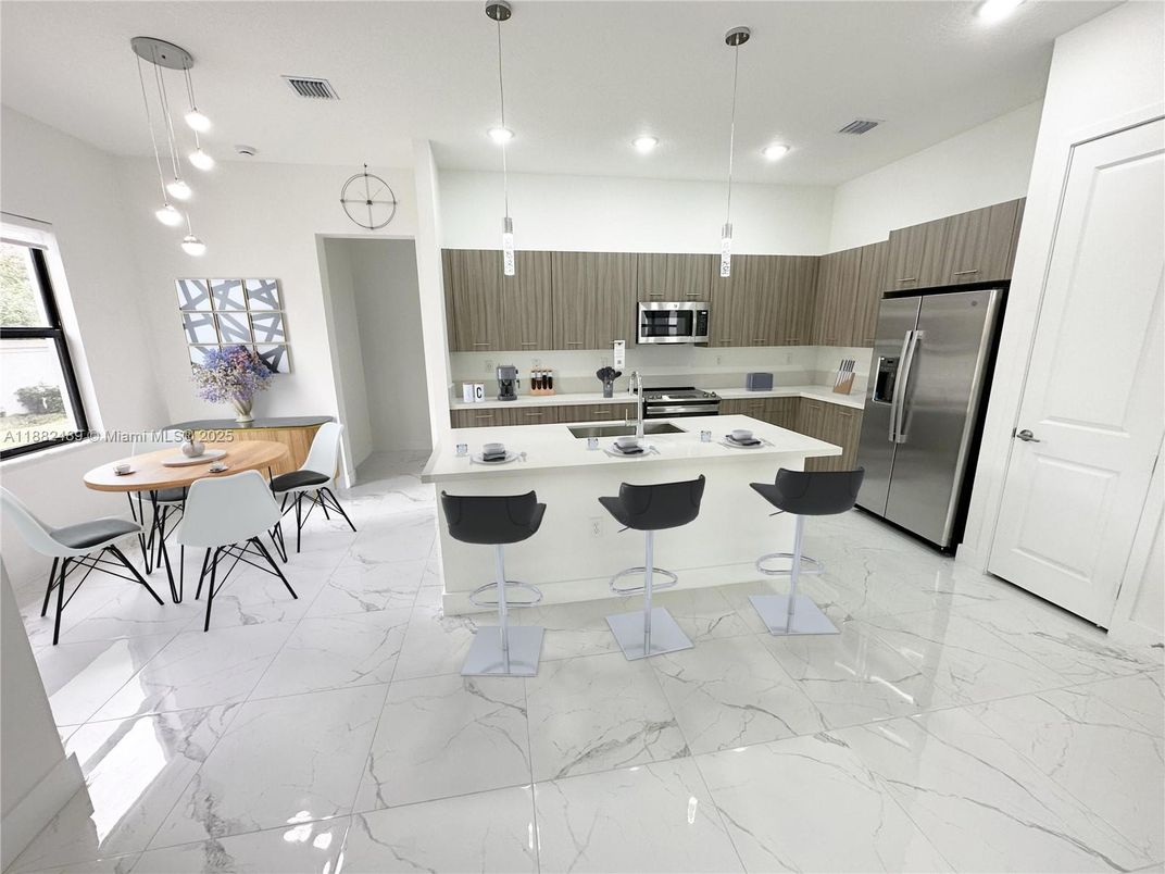 Dining room, Interior, Kitchen, Marble, Pendant Lights, Recessed Lighting, Stainless Steel Appliances