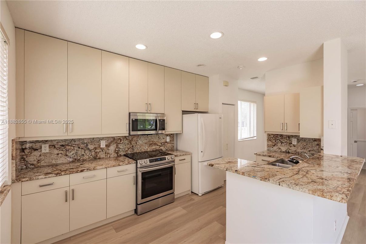 Interior, Kitchen, Recessed Lighting, Stainless Steel Appliances, Wood Texture Flooring